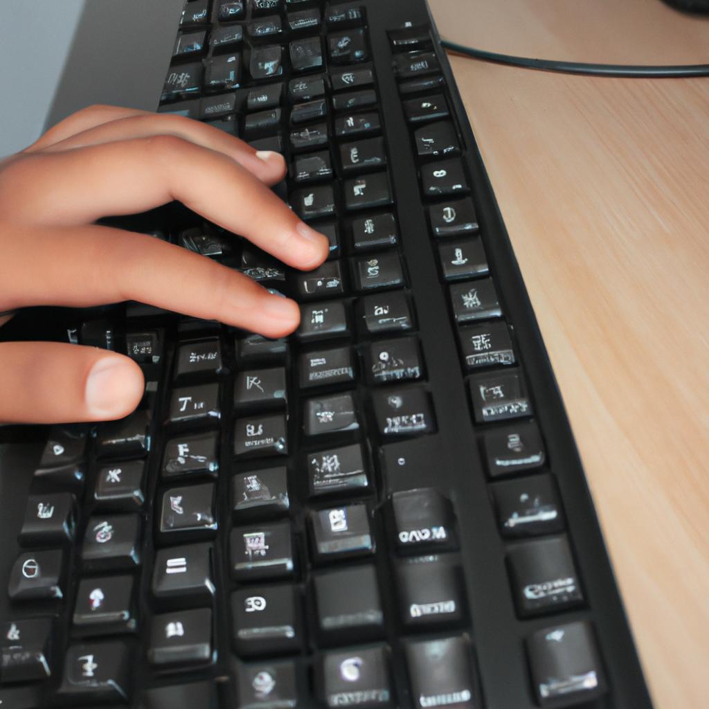 Person using a computer keyboard